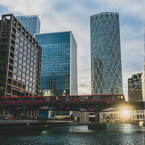 London underground train crossing a bridge in Canary Wharf